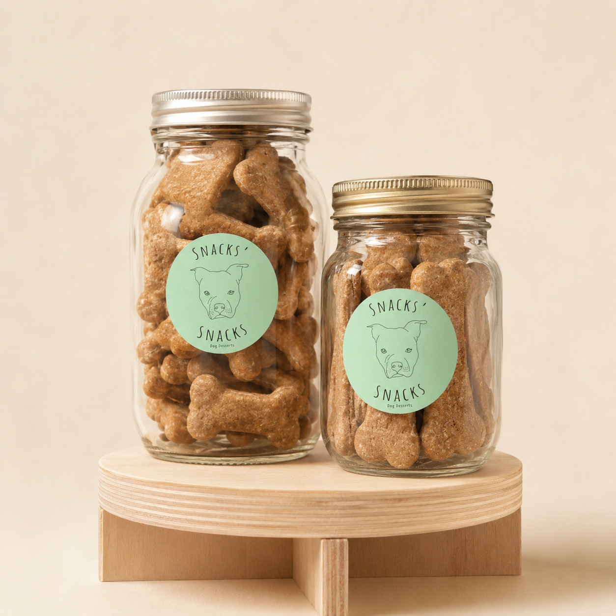 Jars filled with small crunchy peanut butter dog bones